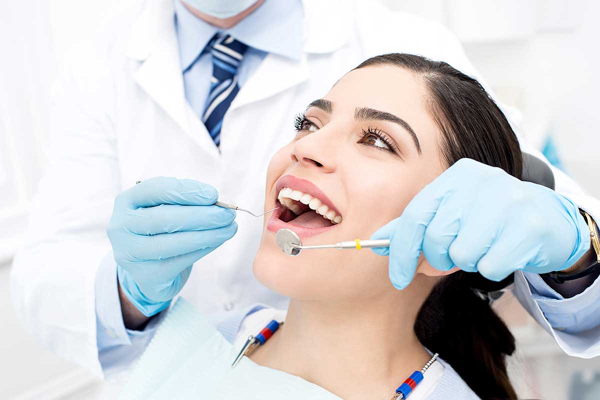Female patient receiving dental care