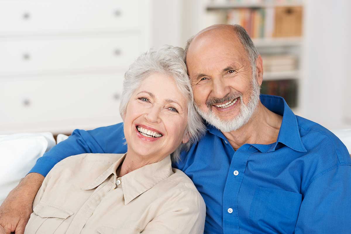 Romantic old couple smiling