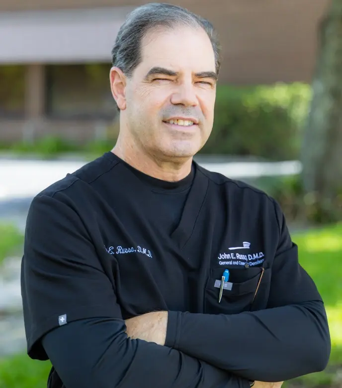 Dr. John E. Russo, D.M.D., general and cosmetic dentist in Orlando, Florida.